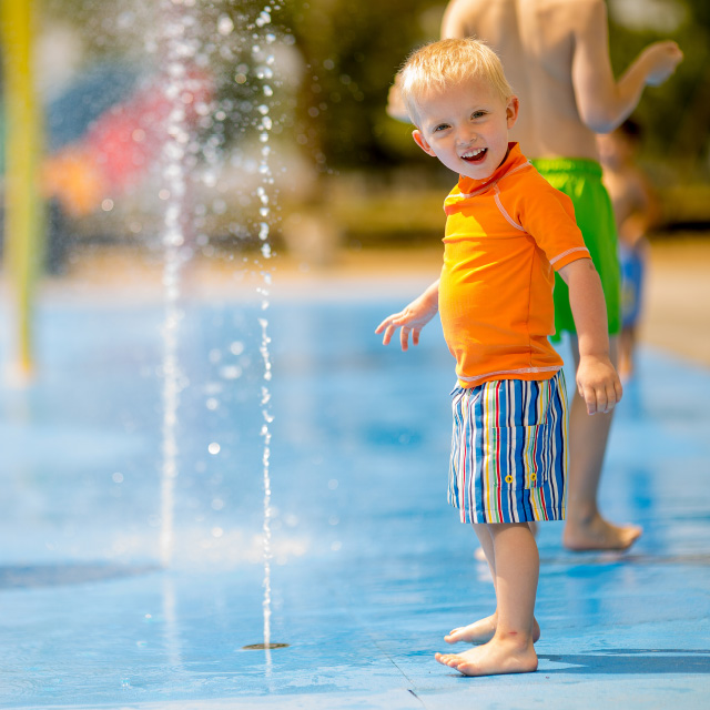 Small boy at a splash park